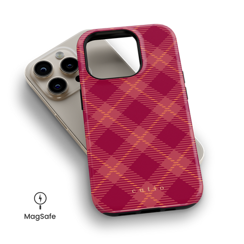 Cecil MagSafe phone case featuring bold and vibrant plaid pattern in deep pink hues with yellow-gold accent, top down view on iPhone