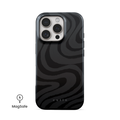 Desert Night MagSafe phone case featuring mysterious dark grey swirls pattern on black background, resembling desert sand under the night sky, front view on iPhone