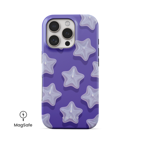 Dreamer MagSafe phone case featuring star-shaped pearls on blueish purple background design, front view on iPhone