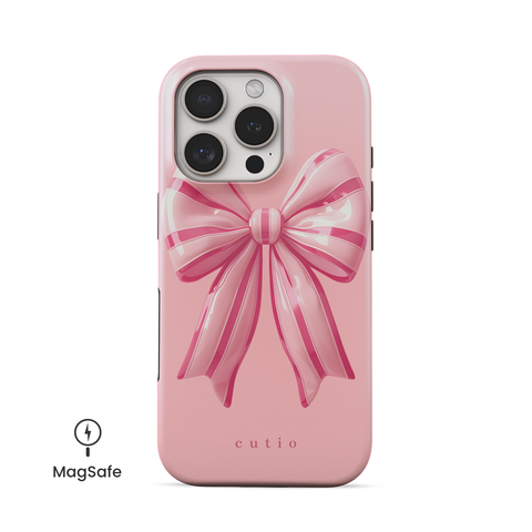 Eye Candy MagSafe phone case featuring adorable 3D striped pink bow design, front view on iPhone