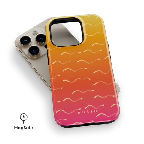 First Light MagSafe phone case featuring wavy beige lines flowing across a soft yellow to pink gradient, evoking early sunlight shimmering over the ocean, top down view on iPhone