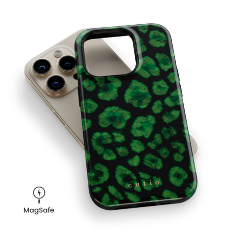 Instinct - Emerald MagSafe phone case featuring abstract emerald green leopard print on a black background, top down view on iPhone