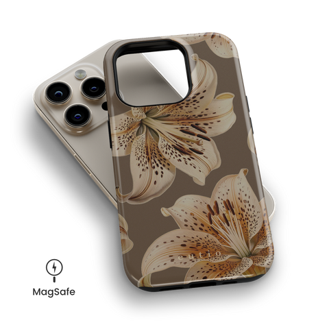 Novelty MagSafe phone case featuring sophisticated oriental lilies pattern on taupe background, top down view on iPhone