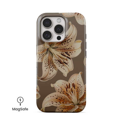 Novelty MagSafe phone case featuring sophisticated oriental lilies pattern on taupe background, front view on iPhone