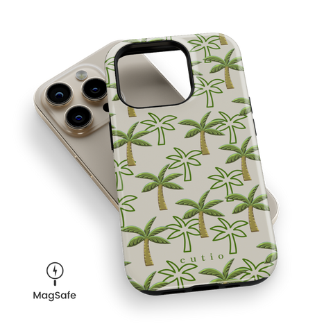 Palm Grove MagSafe phone case featuring pattern of green palm trees on a warm beige background, top down view on iPhone