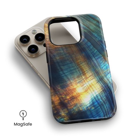 Peacock MagSafe phone case featuring vibrant, abstract pattern in stunning colors of peacock's feathers, top down view on iPhone