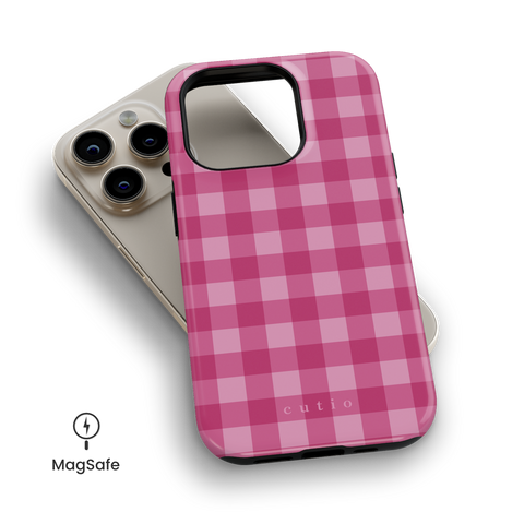 Pink Handkerchief MagSafe phone case featuring lovely white and pink plaid design, top down view on iPhone