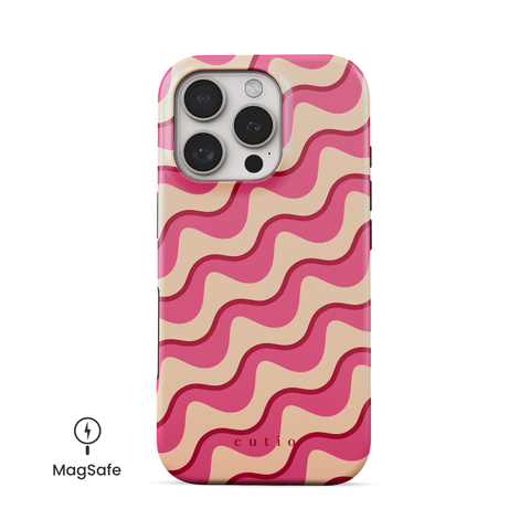 Ruffles MagSafe phone case featuring playful abstract ruffle pattern in red, pink, and beige, front view on iPhone