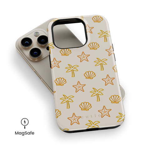 Sandy Beach MagSafe phone case featuring glossy yellow palm trees, starfish, and seashells scattered over a warm, creamy beige background, top down view on iPhone