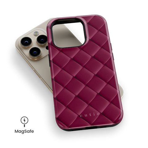 Satin Mulberry MagSafe phone case featuring sleek crisscross pattern in deep satin mulberry, top down view on iPhone