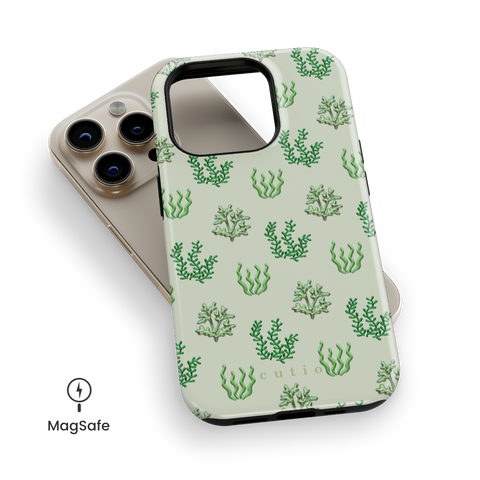 Sea Garden MagSafe phone case featuring glossy green seaweed and algae illustrations over a pale mint green background, top down view on iPhone
