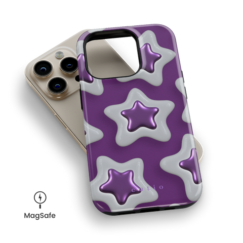 Star Charm MagSafe phone case featuring shiny 3D metallic purple stars on a rich purple background, top down view on iPhone