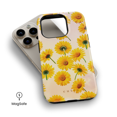 Summer Afternoon MagSafe phone case featuring bright yellow daisy flowers against a summer afternoon sky, top down view on iPhone