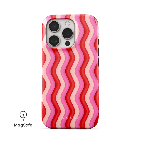 Unwind MagSafe phone case featuring bold Y2K-inspired groovy waves design in red, pink, and beige tones, front view on iPhone