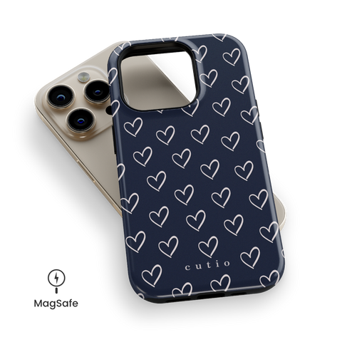 With Love - Navy Blue MagSafe phone case featuring small hand-drawn heart pattern in off-white on a deep navy blue background, top down view on iPhone