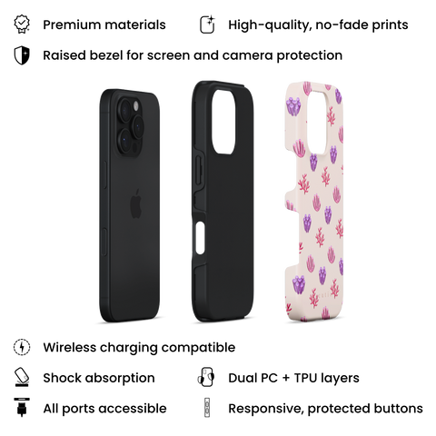 Blooming Coral tough phone case featuring glossy red, pink, and purple coral motifs scattered over a pale blush background, layers view on iPhone