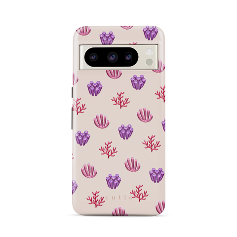 Blooming Coral tough phone case featuring glossy red, pink, and purple coral motifs scattered over a pale blush background, front view on Google Pixel phone