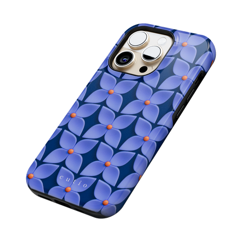 Blue Hydrangea tough phone case featuring abstract glossy blue hydrangea flower pattern with orange centers on a deep navy blue background, side view on iPhone