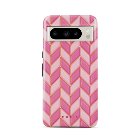 Blush Chevron tough phone case featuring glossy 3D-effect chevron pattern in alternating blush and pink with gold trim details, front view on Google Pixel phone