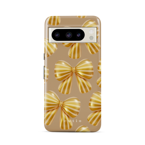Bow Chic - Gold tough phone case featuring bold, eye-catching gold-striped bows on a muted gold backdrop, front view on Google Pixel phone