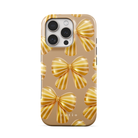 Bow Chic - Gold tough phone case featuring bold, eye-catching gold-striped bows on a muted gold backdrop, front view on iPhone