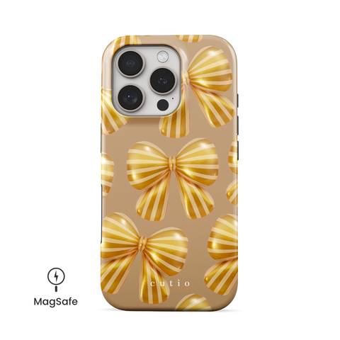 Bow Chic - Gold MagSafe phone case featuring bold, eye-catching gold-striped bows on a muted gold backdrop, front view on iPhone