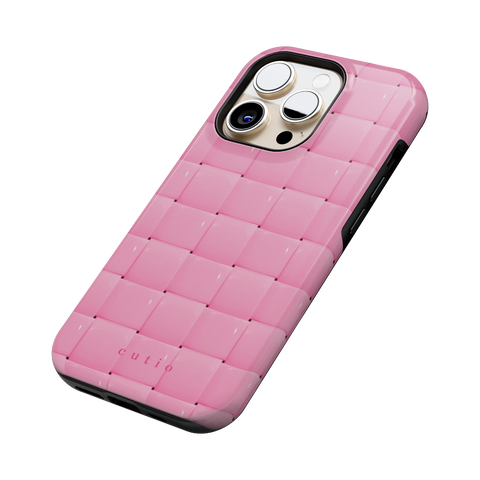 Bubbly Pink tough phone case featuring glossy woven pattern in soft pink, side view on iPhone