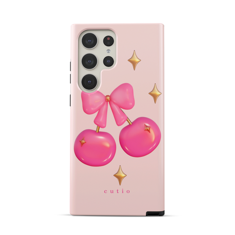 Cherry Pop tough phone case featuring glossy 3D-style hot pink cherries adorned with gold sparkles, tied together by a cute pink bow, front view on Samsung Galaxy phone
