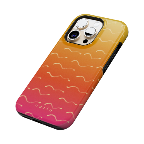 First Light tough phone case featuring wavy beige lines flowing across a soft yellow to pink gradient, evoking early sunlight shimmering over the ocean, side view on iPhone