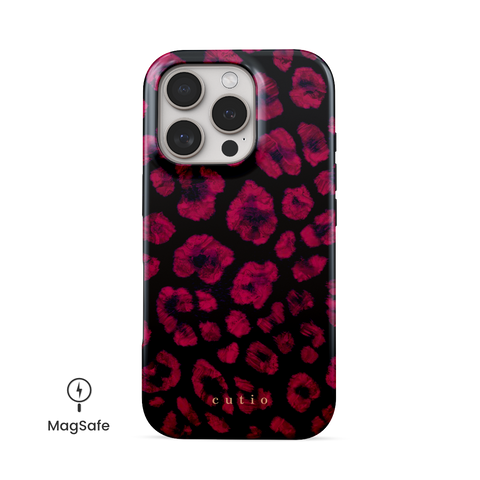 Instinct - Ruby MagSafe phone case featuring abstract ruby red leopard print on a black background, front view on iPhone