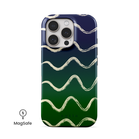 Night Swim MagSafe phone case featuring flowy beige lines sweeping over a moody gradient from navy blue to deep green, front view on iPhone