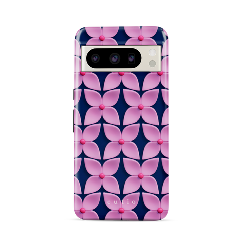 Pink Hydrangea tough phone case featuring abstract glossy pink hydrangea flower pattern with hot pink centers on a deep navy blue background, front view on Google Pixel phone