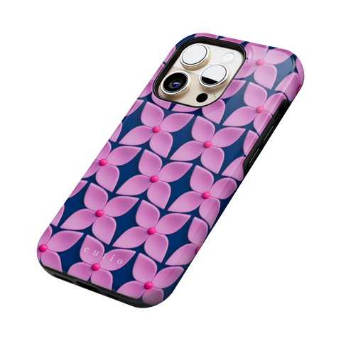 Pink Hydrangea tough phone case featuring abstract glossy pink hydrangea flower pattern with hot pink centers on a deep navy blue background, side view on iPhone