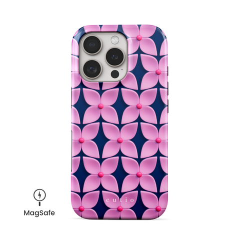 Pink Hydrangea MagSafe phone case featuring abstract glossy pink hydrangea flower pattern with hot pink centers on a deep navy blue background, front view on iPhone