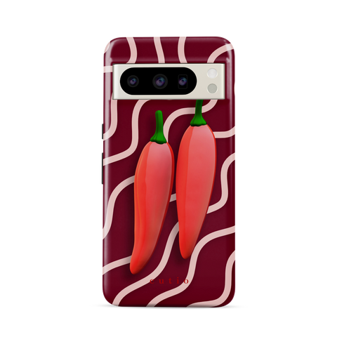 Red Hot Chillies tough phone case featuring bold red chillies on a burgundy background, front view on Google Pixel phone