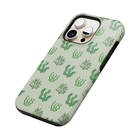 Sea Garden tough phone case featuring glossy green seaweed and algae illustrations over a pale mint green background, side view on iPhone