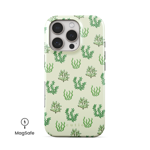 Sea Garden MagSafe phone case featuring glossy green seaweed and algae illustrations over a pale mint green background, front view on iPhone