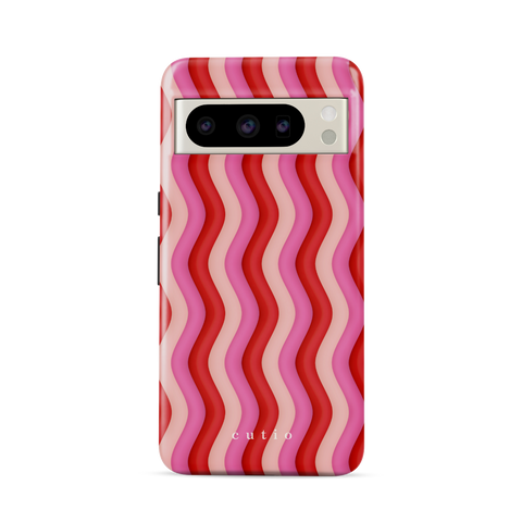 Unwind tough phone case featuring bold Y2K-inspired groovy waves design in red, pink, and beige tones, front view on Google Pixel phone