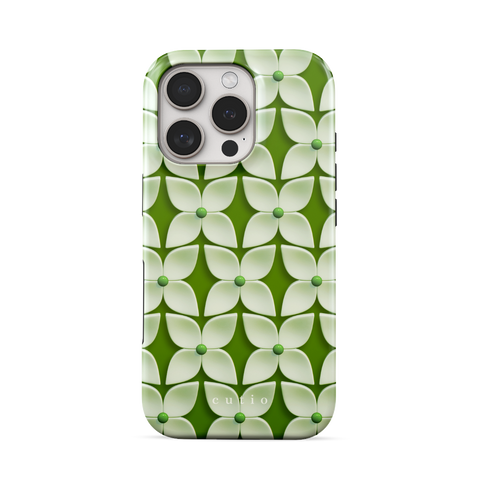 White Hydrangea tough phone case featuring abstract glossy white hydrangea flower pattern with green centers on a soft green background, front view on iPhone