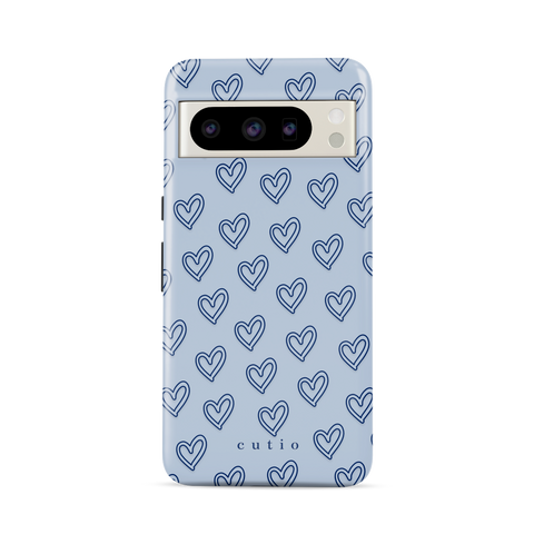 With Love - Dusty Blue tough phone case featuring small hand-drawn heart pattern on a soft dusty blue background, front view on Google Pixel phone