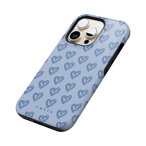 With Love - Dusty Blue tough phone case featuring small hand-drawn heart pattern on a soft dusty blue background, side view on iPhone
