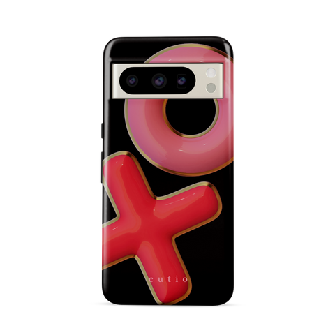 XO tough phone case featuring 3D-effect XO design in bright red and pink with gold trim accents on a black background, front view on Google Pixel phone