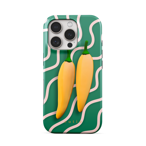 Yellow Sweet Chillies tough phone case featuring playful yellow chillies on a green abstract background, front view on iPhone