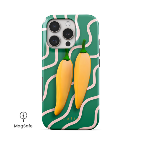 Yellow Sweet Chillies MagSafe phone case featuring playful yellow chillies on a green abstract background, front view on iPhone